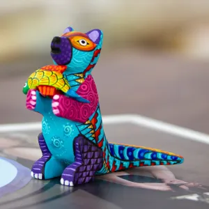 Handcrafted Turquoise Copal Wood Otter and Fish Figurine - Turquoise River Days | NOVICA